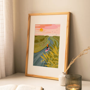 on the river print, paddle board print, paddleboarding wall art, river illustration print, SUP artwork, stand up paddle board art, A4 art print, gift for paddle boarders, river lover gift, water sports art, nature inspired wall art, calm landscape print, wanderlust collection print, outdoor adventure art, river decor, tranquil wall art, minimalist nature print, sustainable art print, UK illustrated wall art, river scene artwork