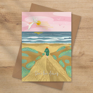 Greeting card with a beach scene of a wild swimmer walking over the final dune towards the sea