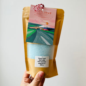 Aromatherapy bath potion made with an artful blend of pure essential oils: Lavender &amp; Marjoram and sea salt.