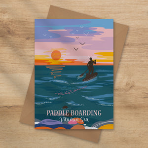 Greeting card with paddle boarding design Vitamin sea coastal card