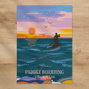 Greeting card with a paddle boarder on a sunset background with 'Paddle Boarding Vitamin Sea' text.