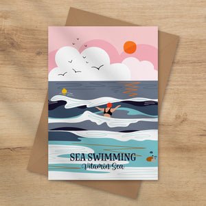 Card with a sea-themed design featuring a wild swimmer, clouds, and sun. Sea swimming greeting card onneke