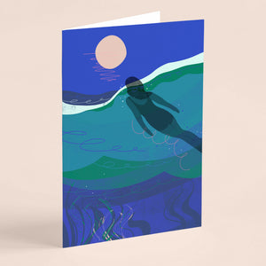 Cold water swimming card with sea swimmer and full moon