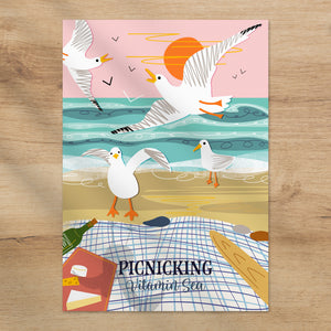 picnic print, beach picnic artwork, seagull illustration print, coastal art print, seaside wall art, A4 coastal wall art, vitamin sea collection, beach life illustration, coastal home decor, beach house artwork, ocean inspired print, fun coastal art, gift for sea lovers, seaside kitchen decor, summer beach print, British coastline art, playful seagull art, nature inspired wall art, UK coastal illustration