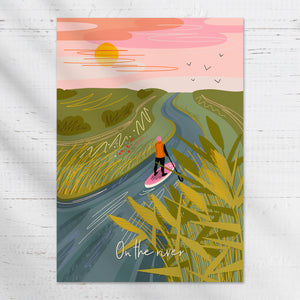 on the river print, paddle board print, paddleboarding wall art, river illustration print, SUP artwork, stand up paddle board art, A4 art print, gift for paddle boarders, river lover gift, water sports art, nature inspired wall art, calm landscape print, wanderlust collection print, outdoor adventure art, river decor, tranquil wall art, minimalist nature print, sustainable art print, UK illustrated wall art, river scene artwork