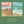 Two illustrated beach-themed cards titled 'the Christmas walk' and 'the Christmas swim' on a green background, with text below reading '3 of each card +6 white envelopes + belly band'.