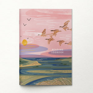 Reading logbook with a colorful landscape design on a white background