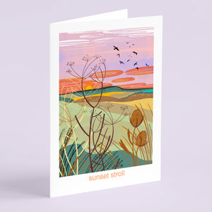 Greeting card with a sunset landscape design on a white background with seed pods and rolling hills. A nature card with illustration by onneke