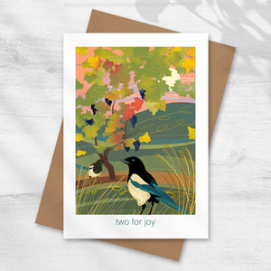 Two magpies under autumn vines ready for harvest, nature illustration on greeting card by onneke