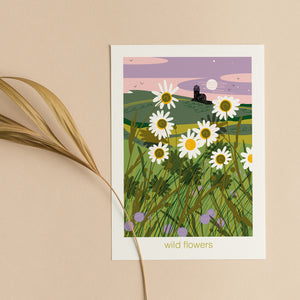 Greeting card with illustration of a field of wildflowers and a lighthouse nature greeting card coastal illustration by onneke